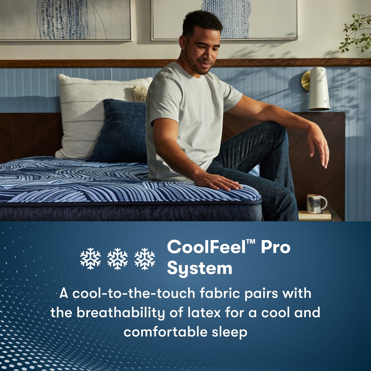 Man sitting on the right side of a Perfect Sleeper Pro Geneva Firm Mattress feeling the cool to the touch top of the mattress || Level: Level 2 || Feel: Firm