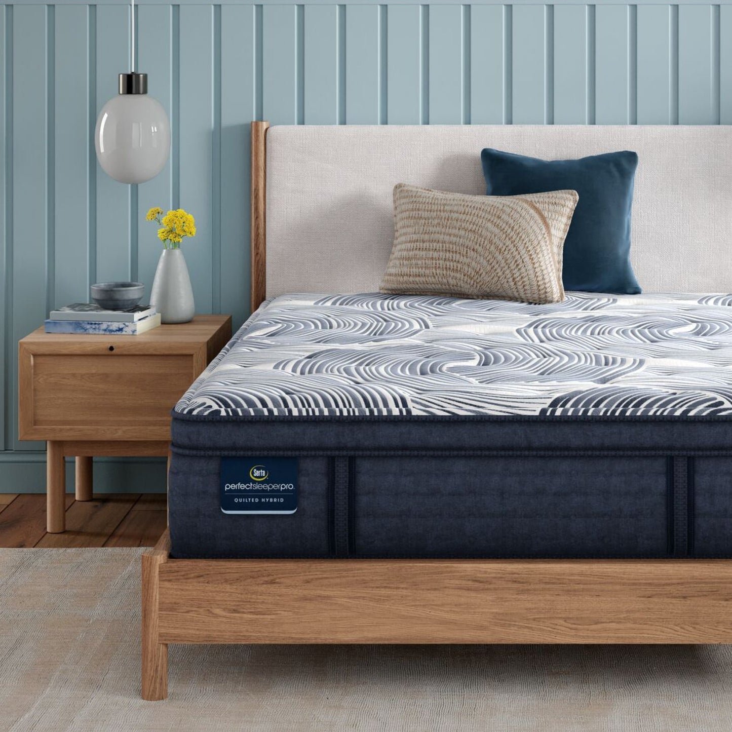 Perfect Sleeper Pro Edinburgh Plush Pillow Top mattress sitting in a brown bedframe || Level: Level 2 || Feel: Plush Pillow Top