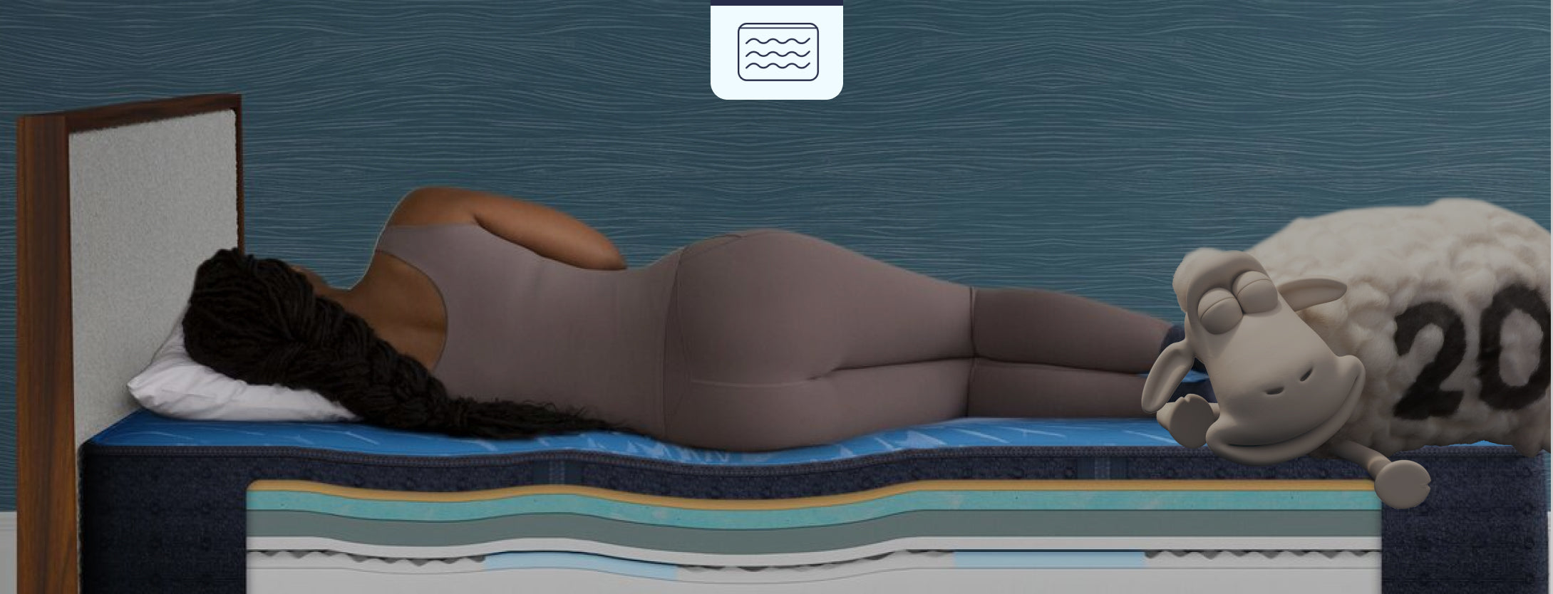 Person sleeping on a Serta memory foam mattress with a cutaway view showcasing its supportive, pressure-relieving foam layers, while a relaxed Serta sheep rests on top.