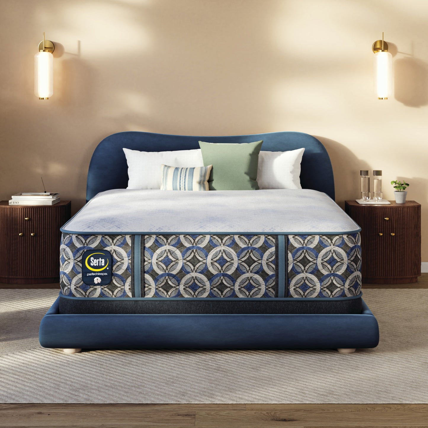 Blue upholstered bed with a Serta perfect sleeper hybrid medium  mattress in a bedroom setting