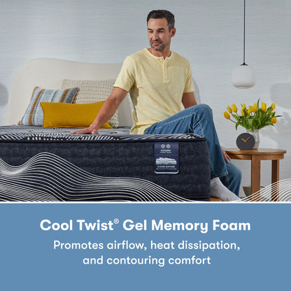 Man sitting on the right side of a Perfect Sleeper X Hybrid Kendall Medium Mattress rubbing on the mattress || feel: medium || level: Level 1