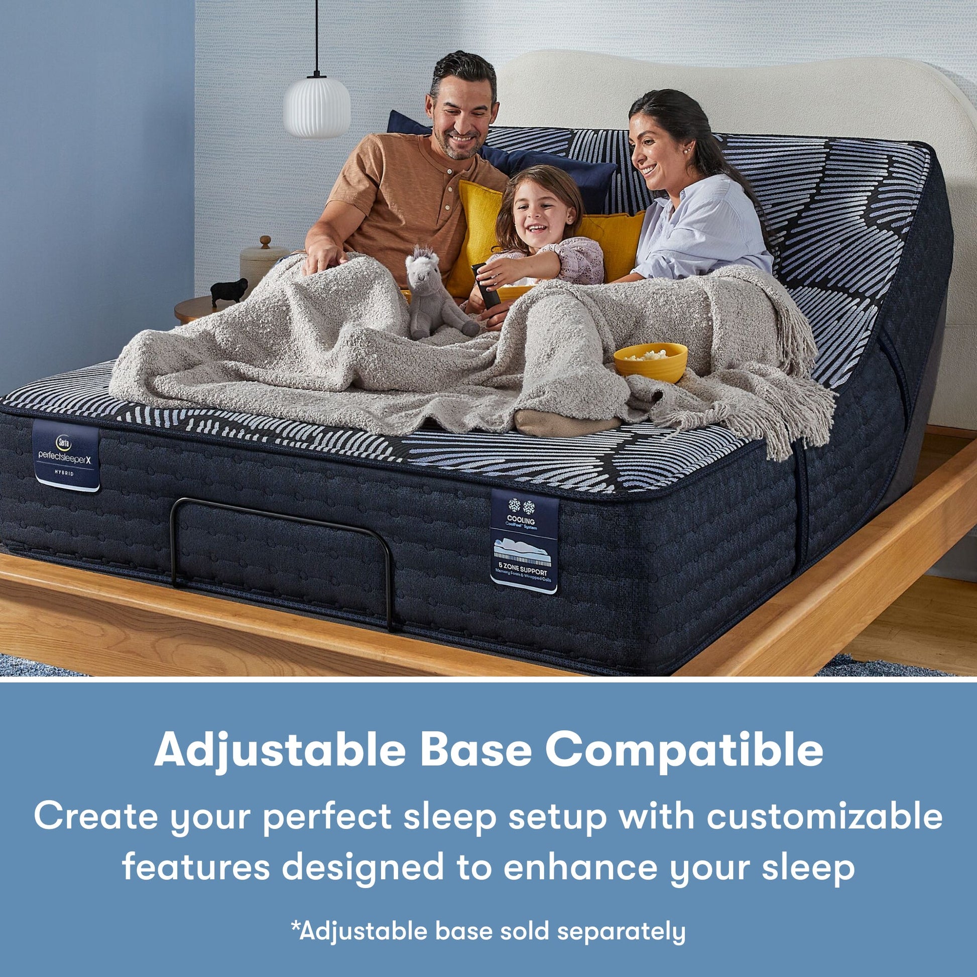 Family of 3 sitting on a Perfect Sleeper X Hybrid Kendall Medium Mattress sitting in the an adjustable base frame || feel: medium || level: Level 1