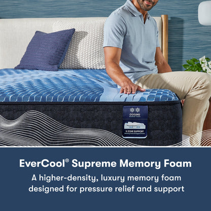 Man sitting on the right side of a Serta iComfort mattress || feel: plush || level: Enhanced - 14"