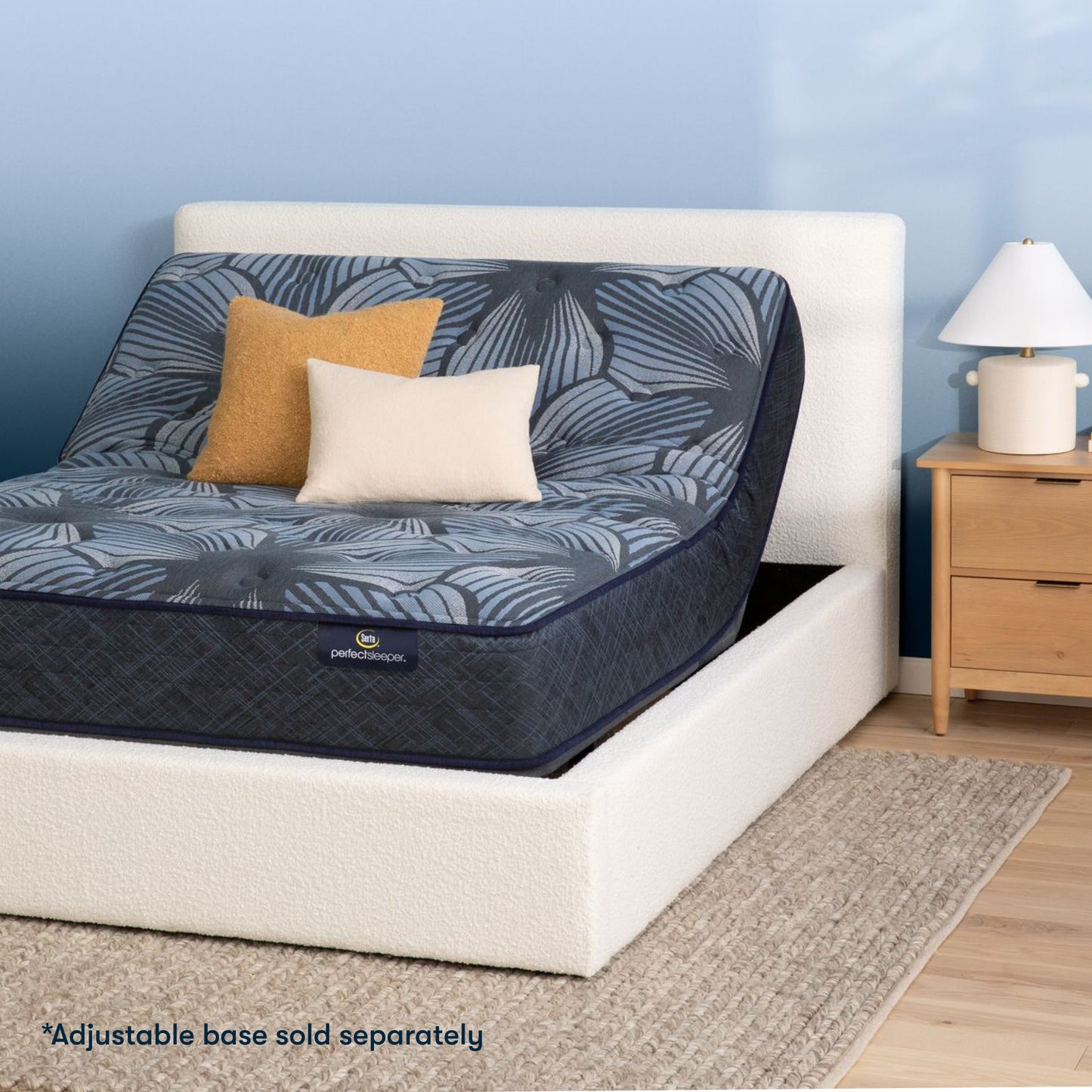 The Serta Perfect Sleeper Sleep Excellence mattress in a bedroom on the Serta adjustable base| feel: Firm